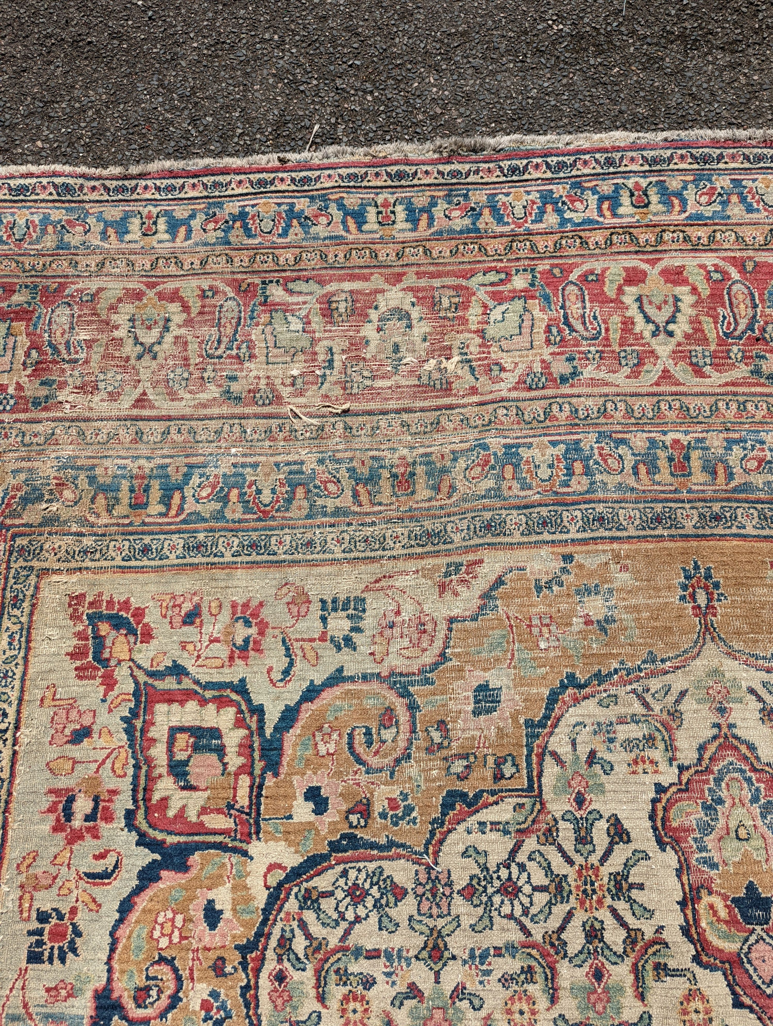 An Isfahan ivory ground carpet, 432 x 330cm